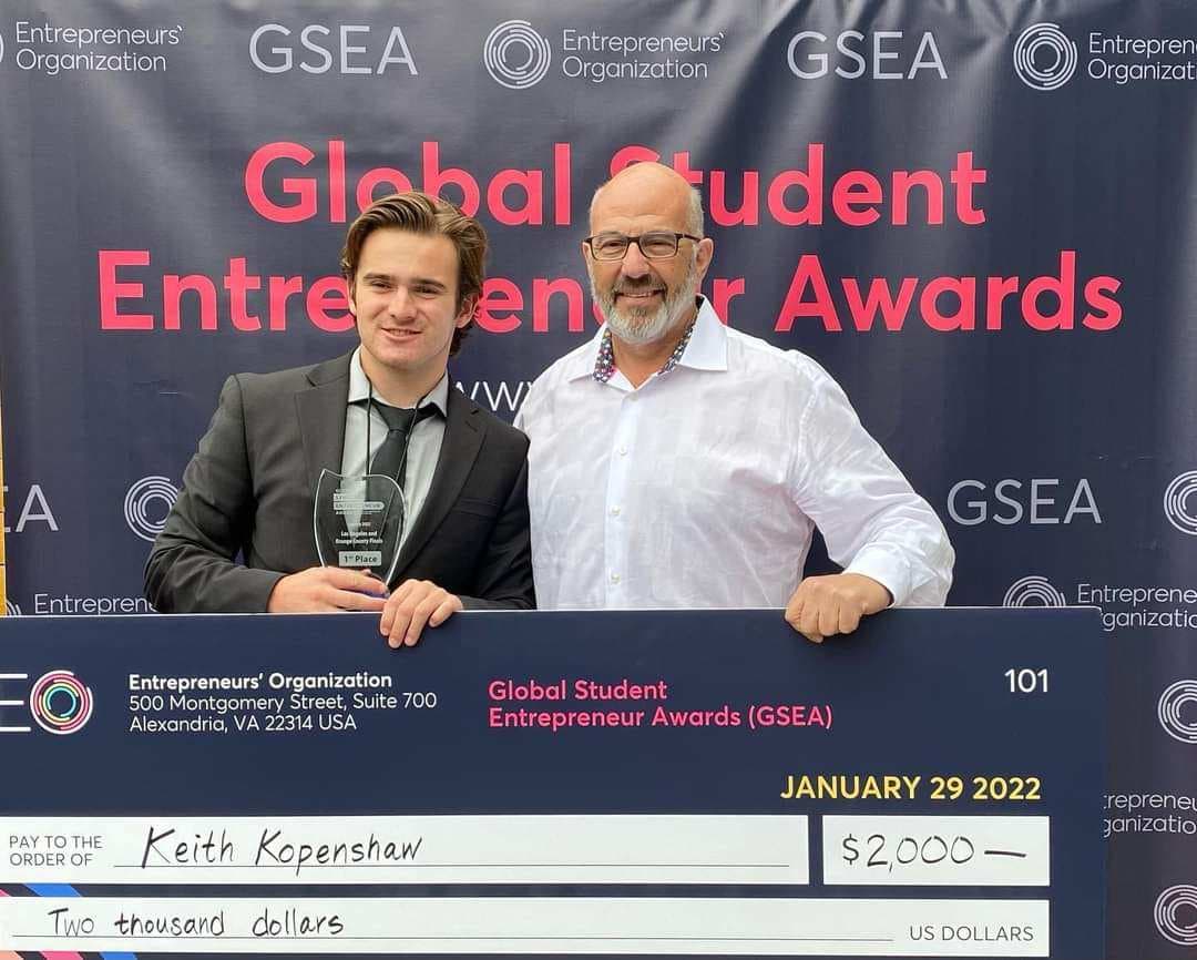 Keith Openshaw receiving first place at the Global Student Entrepreneur Awards